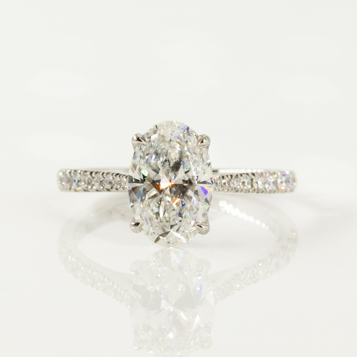 Oval Solitaire Engagement Ring with Side Stones